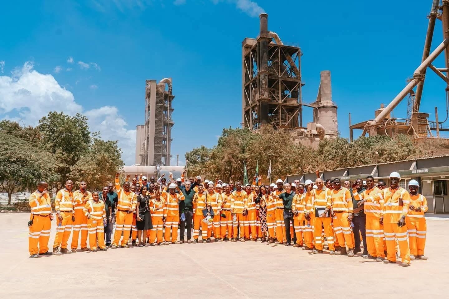 Simba Cement staff group photo in front of the plant